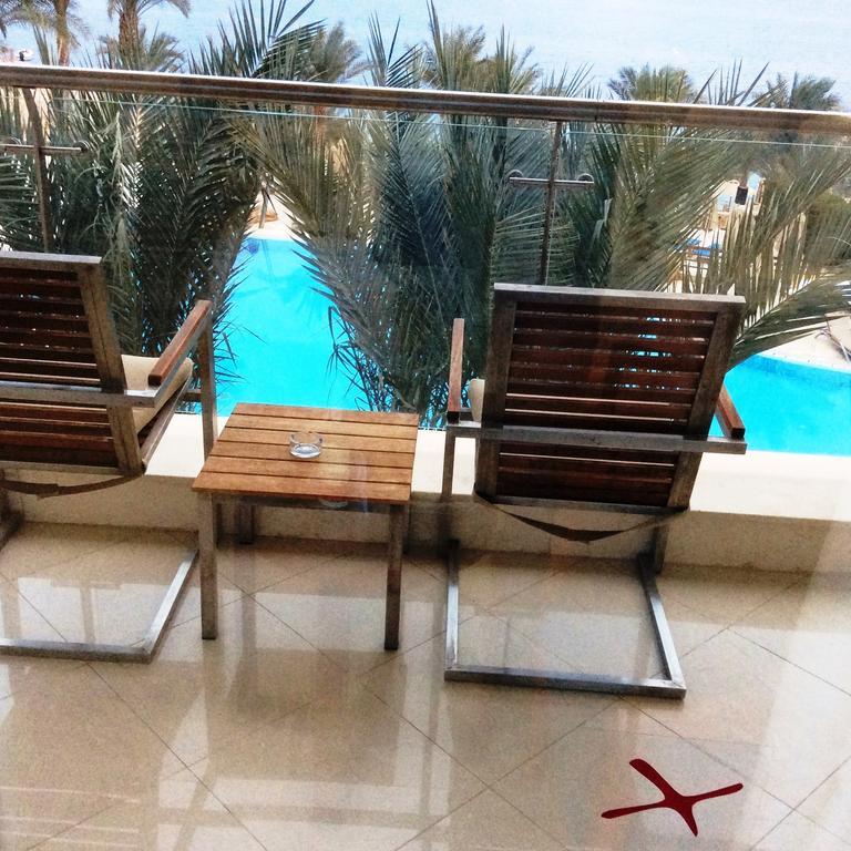 Xperience Sea Breeze Resort (Adults Only) Sharm el Sheikh Esterno foto A balcony at the hotel